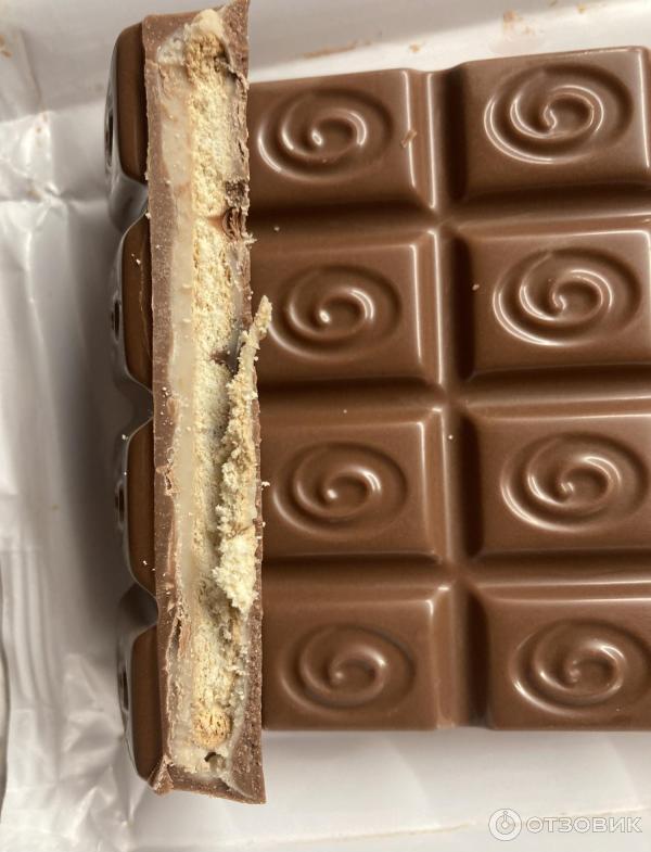 Шоколад молочный Milka MMMAX с начинкой клубничного чизкейка фото