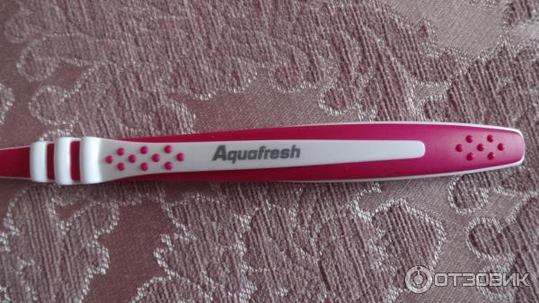 Зубная щетка Aquafresh in-between clean фото