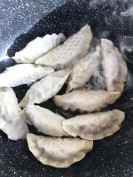 Дамплинги Bibigo "Королевские со свининой и овощами" фото