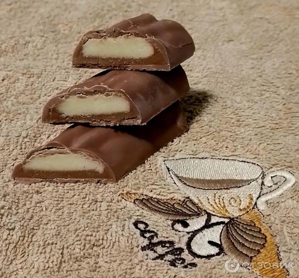 Батончик Douceur Baumstamm Nougat  Edelmarzipan фото