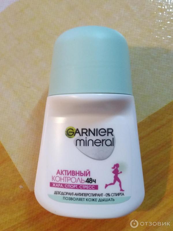 Шариковый дезодорант Garnier Mineral deodorant 48 часов защиты с активными минералами фото